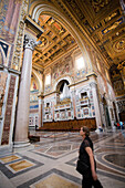 Rome, Italy, July 22 2017, Visitors admire the intricate architecture and art of San Giovanni in Laterano basilica, a historic site in Rome.