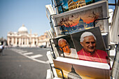 Rome, Italy, July 22 2017, Postcards of popes Benedict XVI and John Paul II near the Vatican, showcasing religious significance and artistry for tourists.