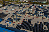 Solar panels on top of a shopping center store