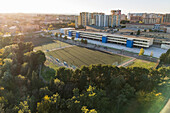 Aerial view of amateur soccer match at sunset