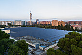 Aerial view of photovoltaic power station in Casablanca water treatment plant and Movistar Telecommunications tower, Zaragoza, Spain