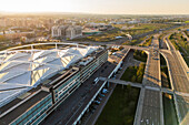 Aerial view of Zaragoza–Delicias railway and central bus station at sunset