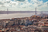 Experience the beauty of Lisbon featuring the 25 April Bridge and Tagus River from the historic viewpoint of São Jorge Castle.