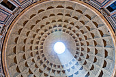 Rome, Italy, July 2017, Experience the stunning architectural details of the Pantheon dome illuminated by sunlight in the heart of Rome.