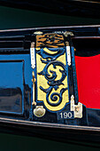 Detail of the traditional decoration of a gondola in Venice, Italy.