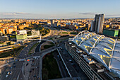 Aerial view of Zaragoza–Delicias railway and central bus station at sunset