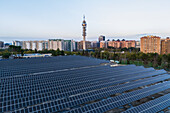 Aerial view of photovoltaic power station in Casablanca water treatment plant and Movistar Telecommunications tower, Zaragoza, Spain