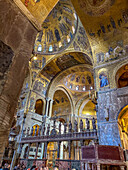 A Gothic altar screen encloses the chancel in St. Mark's Basilica in Venice, Italy.