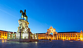 Discover the enchanting Praca do Comercio in Lisbon at dusk, where the equestrian statue and grand architecture come to life.