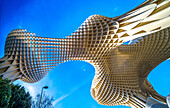 Stunning view of Las Setas in Sevilla, Spain, showcasing its unique architectural design under a vibrant blue sky. A modern landmark symbolizing innovation and creativity.