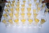 A beautiful arrangement of champagne glasses at a wedding party in Malaga, Spain, capturing the elegance and celebration of the special occasion.