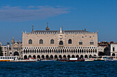 Facade of the Doge's Palace or Palazzo Ducale in Venice, Italy. Viewed from the Giudecca Canal. The Bridge of Sighs is just visible at the right side of the Palace.