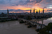 Aerial view of El Pilar Basilica Cathedral and the Ebro River at sunset, Zaragoza, Spain