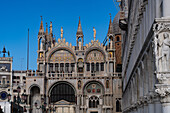 South facade of St. Mark's Basilica with the Doge's Palace at right, in Venice, Italy.