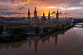 Aerial view of El Pilar Basilica Cathedral and the Ebro River at sunset, Zaragoza, Spain