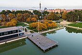 Aerial view of people the wooden dock of an artificial lake