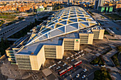 Aerial view of Zaragoza–Delicias railway and central bus station at sunset