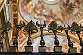 Rome, Italy, July 2017, A decorative wrought iron grille features intricate details in the historic Santa Maria Sopra Minerva Basilica in Rome.