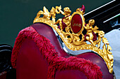 Detail of the traditional decoration of a gondola in Venice, Italy.