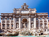 Visitors admire the stunning Trevi Fountain in Rome, capturing the essence of Italian architecture and artistry under a bright sky.