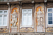 The detailed azulejo tiles of Ferreira das Tabuletas highlight stunning earth and water art in Bairro Alto's urban scene.