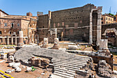 Historic ruins of the Temple of Mars Ultor in Rome with ancient stone columns.