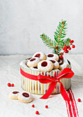 Angel eyes with raspberry jam and icing sugar