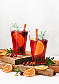 Winter mulled wine with cinnamon, star anise, cranberries and orange