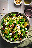 Italian farfalle salad with olives and mozzarella