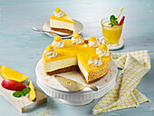 Gluten-free mango cake with soured milk cream and almond base