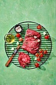 Bavette steak with tomatoes and garlic