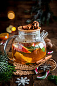 Winter tea with apple slices and cinnamon