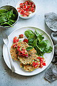 Sweetcorn and courgette pancakes with tomato salsa and baby spinach salad