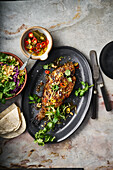 Baked sea bream with colourful Asian salad and chilli pickles
