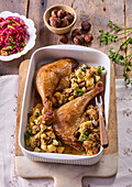 Leg of goose with apple and chestnut stuffing and garnish