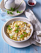 Farfalle Alfredo with cream, parsley and red pepper