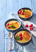 Crème brûlée with egg liqueur and fresh raspberries