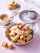Sponge rolls with raspberry and apricot filling