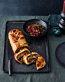 Vegetarian Wellington fillet on quince and red cabbage