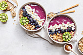 Acai bowl with coconut chips and blackberries