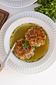 Carinthian cheese dumpling soup with fresh herbs, vegetarian