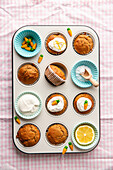 Carrot muffins with quark and yoghurt topping