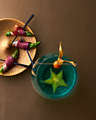 Curacao cocktail with champagne and finger food