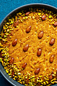 Arabic dessert - Basboussa with almonds and pistachios