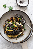 Black pasta alla Siciliana with sardines