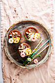 Banana and chocolate dessert with flower decoration