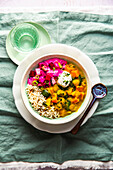 Pumpkin curry with brown rice and cucumber and beetroot raita