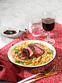 Espresso steaks on spaghettini aglio e olio