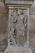 Detail of the Arch of Constantine, a triumphal arch in the Colosseum Archeological Park in Rome, Italy. Depicted is Victoria or the Winged Victory.