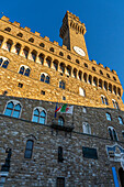 Der Palazzo Vecchio mit dem Arnolfo-Turm auf der Piazza della Signoria in Florenz, Italien.